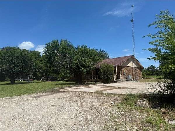 4.5 Acres of Residential Land with Home for Sale in Farmersville, Texas
