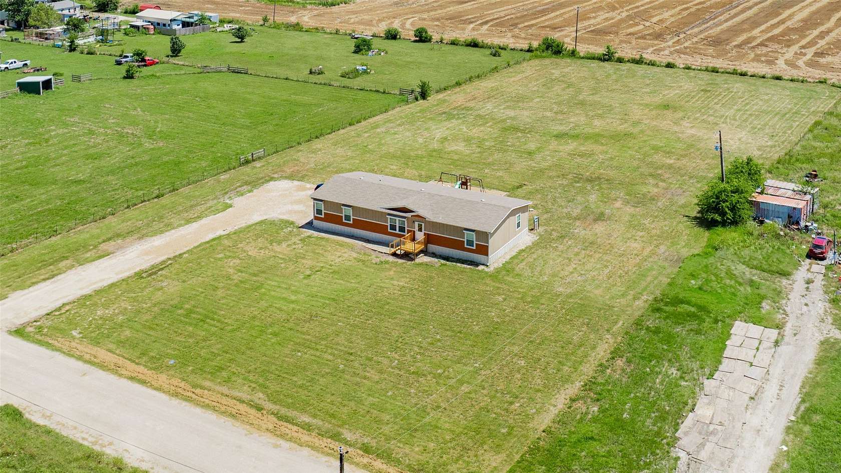 2 Acres of Land with Home for Sale in Quinlan, Texas