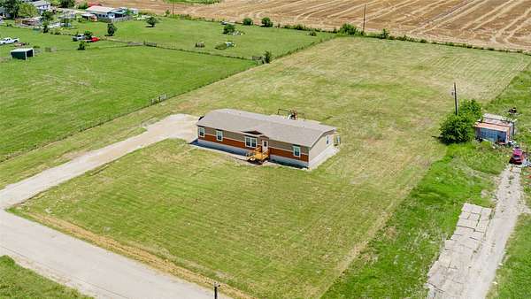2 Acres of Land with Home for Sale in Quinlan, Texas