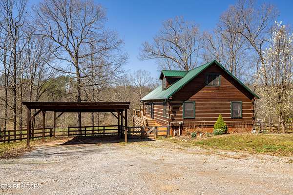 5.1 Acres of Land with Home for Sale in Greenback, Tennessee
