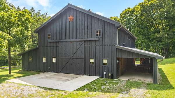 24.6 Acres of Land with Home for Sale in Reliance, Tennessee