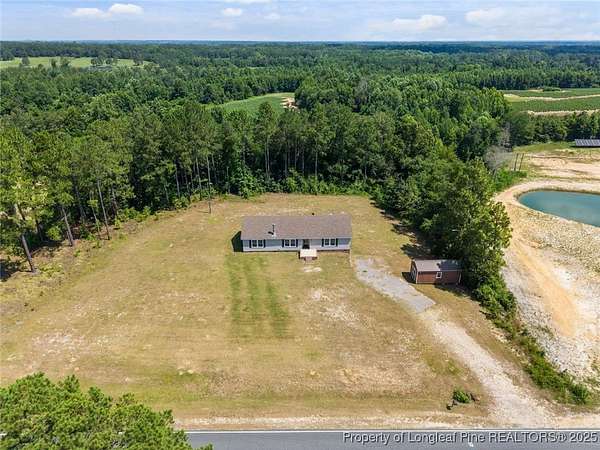 2.64 Acres of Residential Land with Home for Sale in Bunnlevel, North Carolina