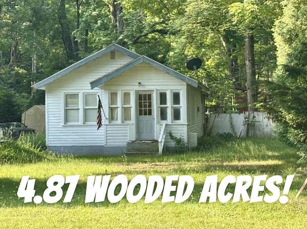 4.87 Acres of Residential Land with Home for Sale in Norton Shores, Michigan