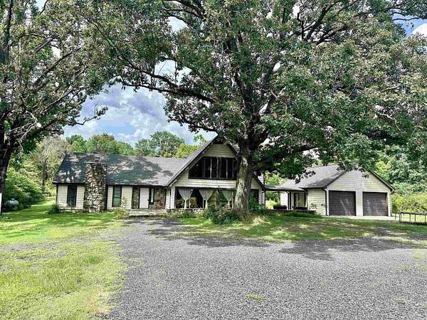 9 Acres of Residential Land with Home for Sale in Mena, Arkansas