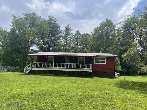 5.9 Acres of Residential Land with Home for Sale in Robbins, Tennessee