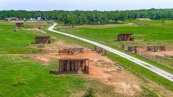 29.6 Acres of Agricultural Land with Home for Sale in Granbury, Texas