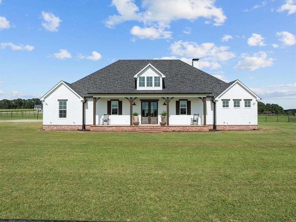 35.7 Acres of Agricultural Land with Home for Sale in Lindale, Texas