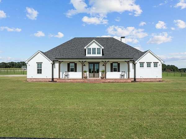 35.7 Acres of Agricultural Land with Home for Sale in Lindale, Texas