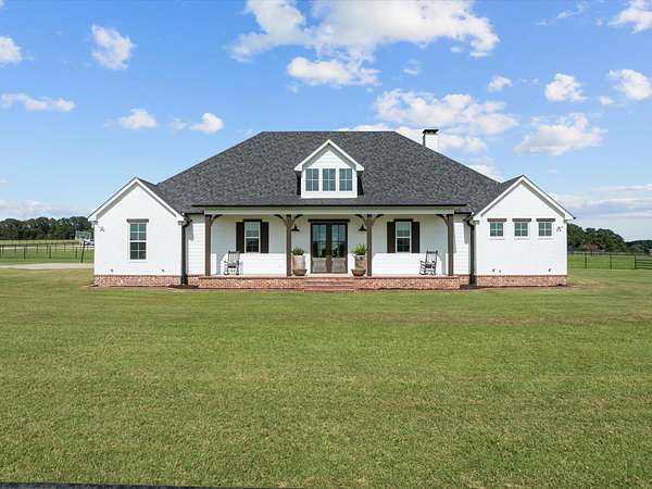 35.7 Acres of Agricultural Land with Home for Sale in Lindale, Texas