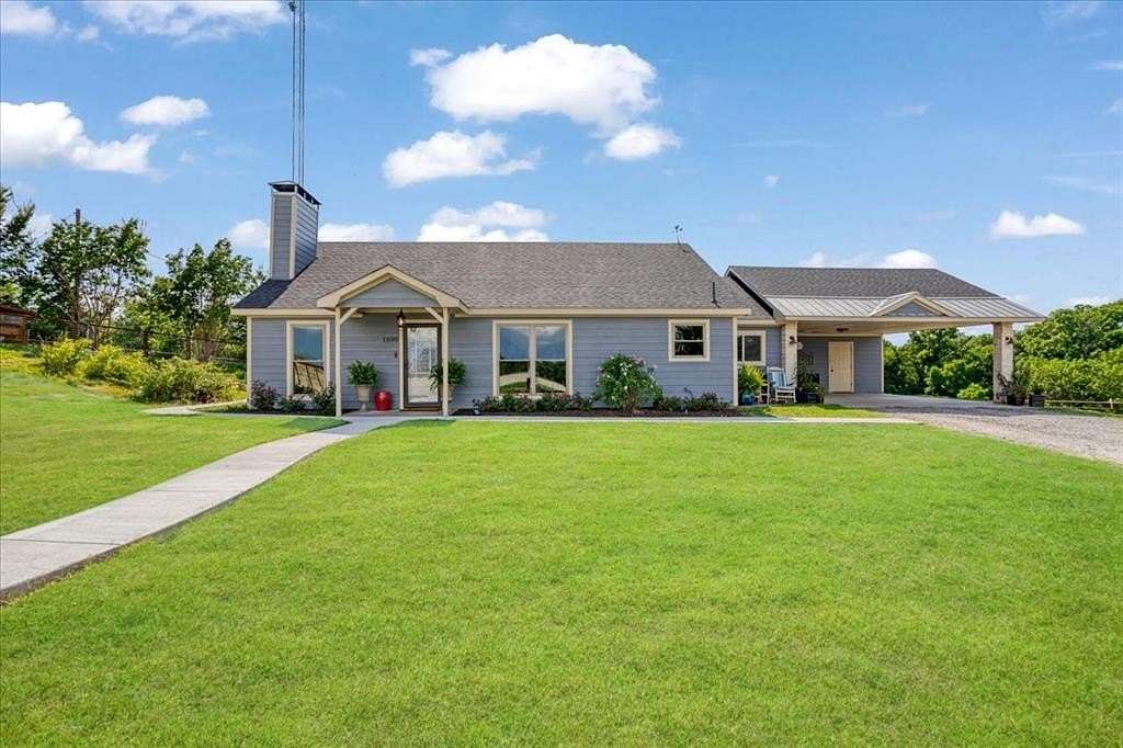 30.3 Acres of Agricultural Land with Home for Sale in Tom Bean, Texas