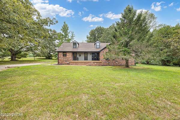 19.7 Acres of Land with Home for Sale in Cedar Grove, Tennessee