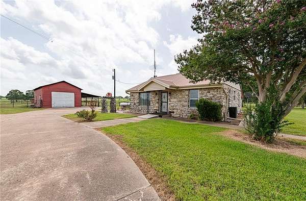 60.3 Acres of Agricultural Land with Home for Sale in Somerville, Texas