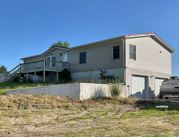 10 Acres of Residential Land with Home for Sale in Sutherland, Nebraska