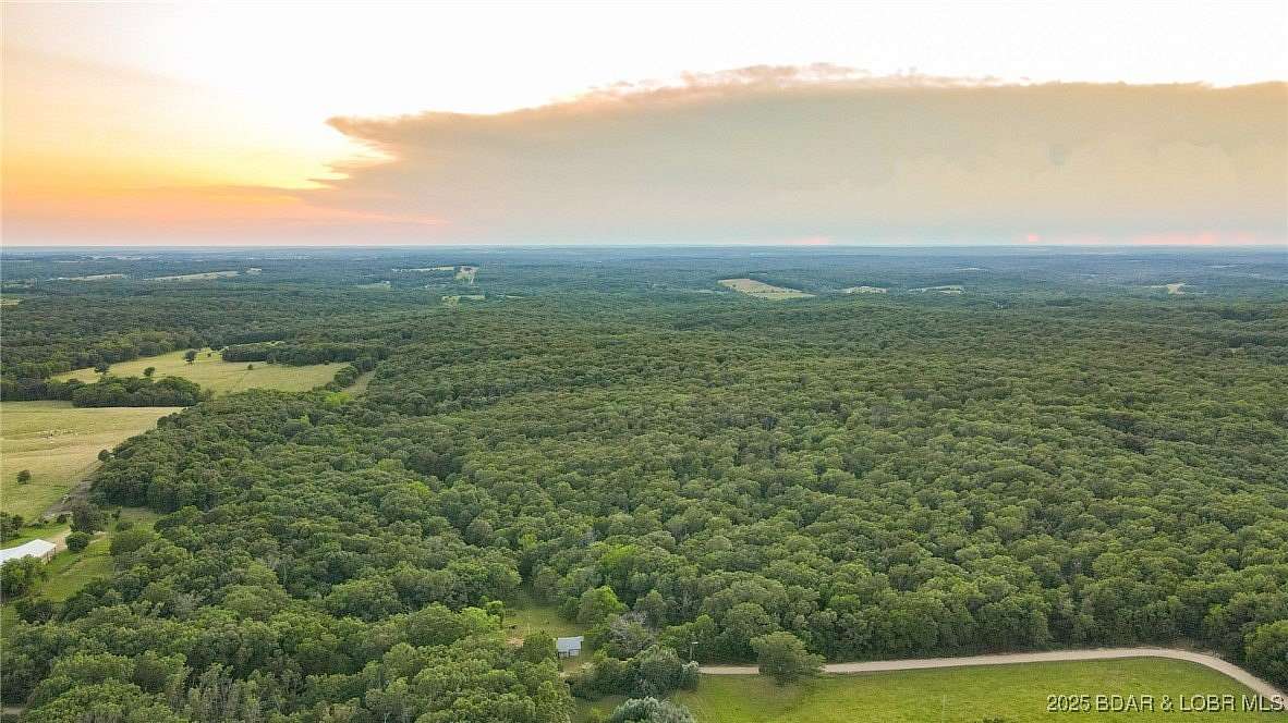 176 Acres of Recreational Land with Home for Sale in Edwards, Missouri