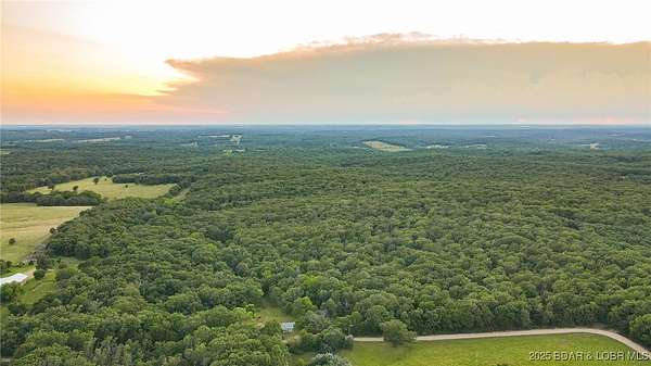 176 Acres of Recreational Land with Home for Sale in Edwards, Missouri