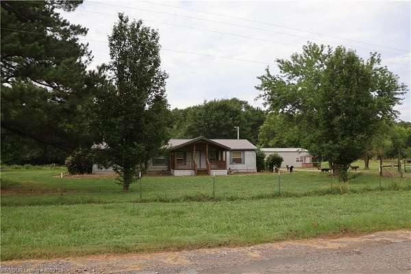 9.8 Acres of Land with Home for Sale in Heavener, Oklahoma