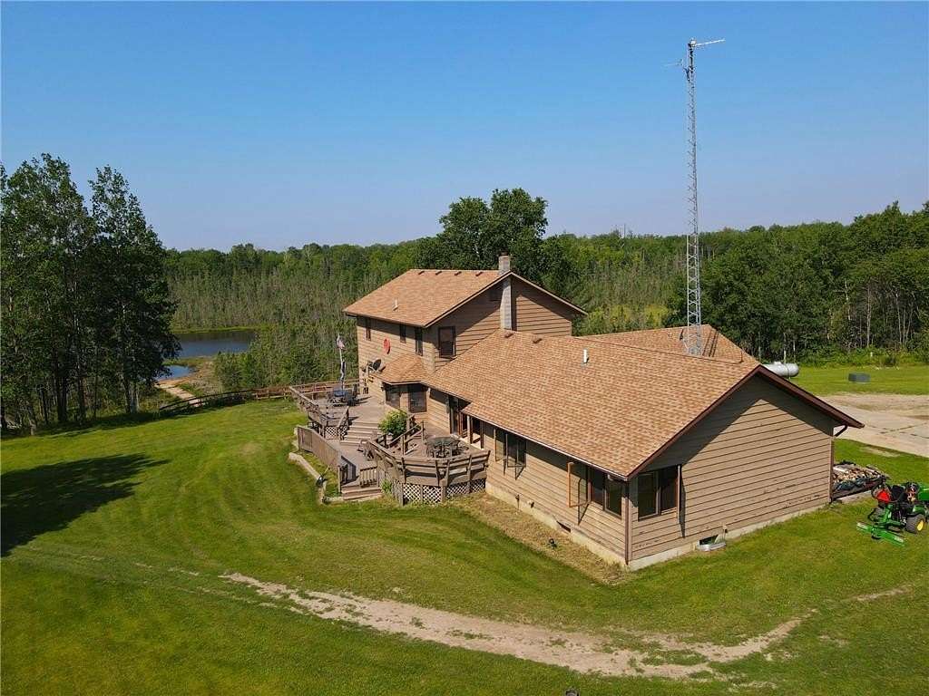 24.3 Acres of Agricultural Land with Home for Sale in Bovey, Minnesota