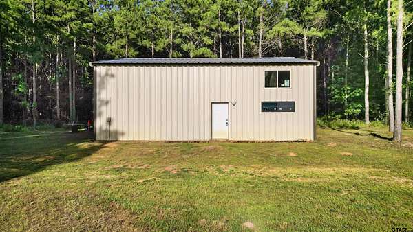 17.6 Acres of Land with Home for Sale in Troup, Texas