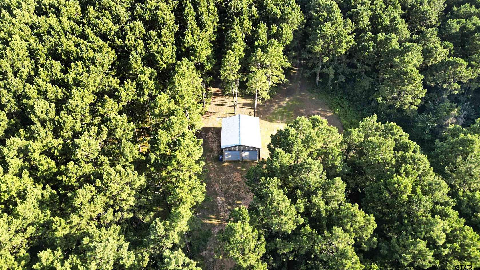 34.6 Acres of Recreational Land with Home for Sale in Troup, Texas