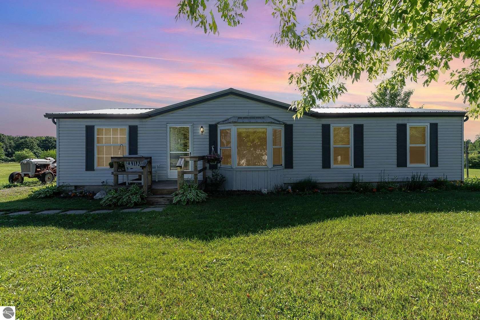 11.2 Acres of Recreational Land with Home for Sale in Whittemore, Michigan