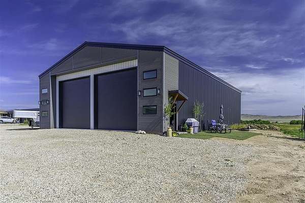 10.4 Acres of Land with Home for Sale in Cody, Wyoming