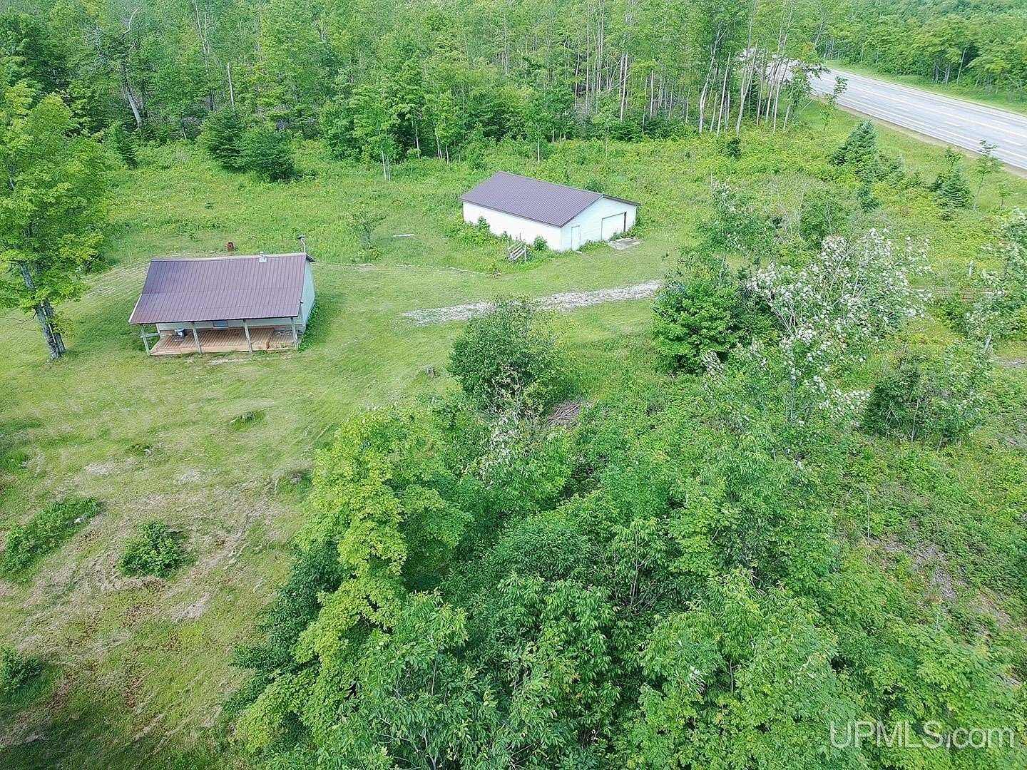80 Acres of Recreational Land with Home for Sale in Gulliver, Michigan