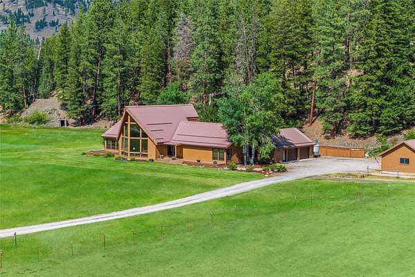 12.7 Acres of Land with Home for Sale in Clinton, Montana
