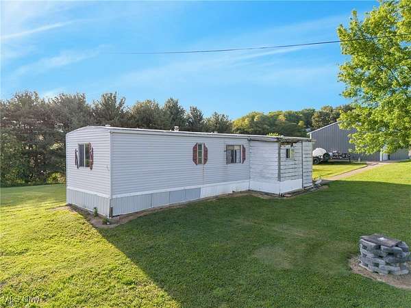 8.83 Acres of Residential Land with Home for Sale in Hanoverton, Ohio