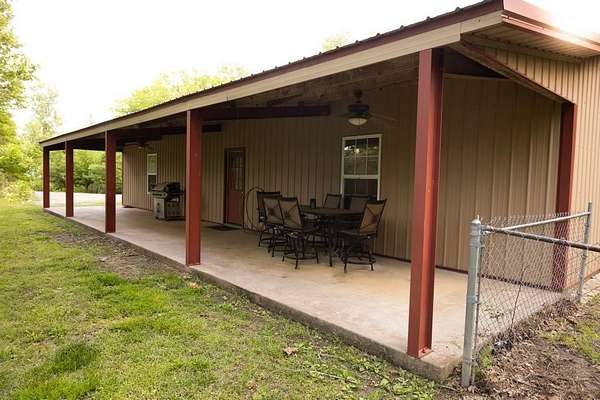 27.5 Acres of Recreational Land with Home for Sale in Pittsburg, Kansas