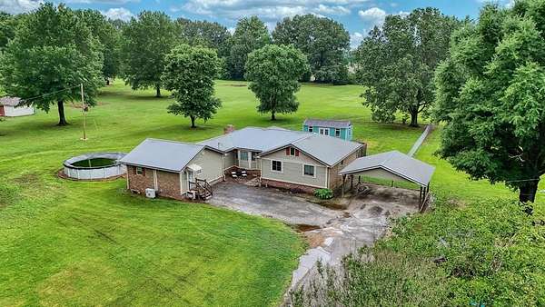 2.9 Acres of Residential Land with Home for Sale in Huntingdon, Tennessee