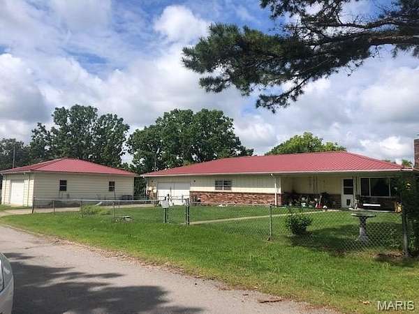 1.7 Acres of Residential Land with Home for Sale in St. Robert, Missouri