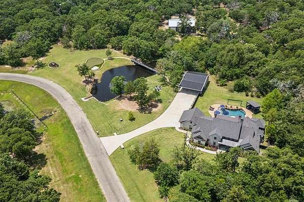 3 Acres of Residential Land with Home for Sale in Quinlan, Texas