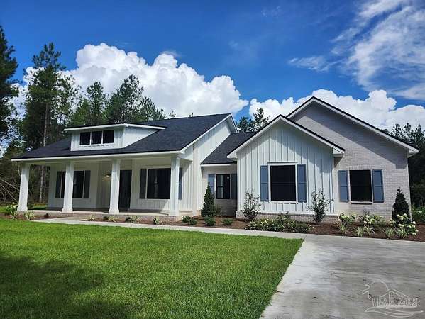 4 Acres of Land with Home for Sale in Pace, Florida