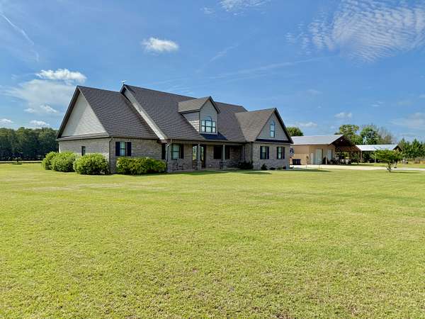 104 Acres of Land with Home for Sale in Ashford, Alabama