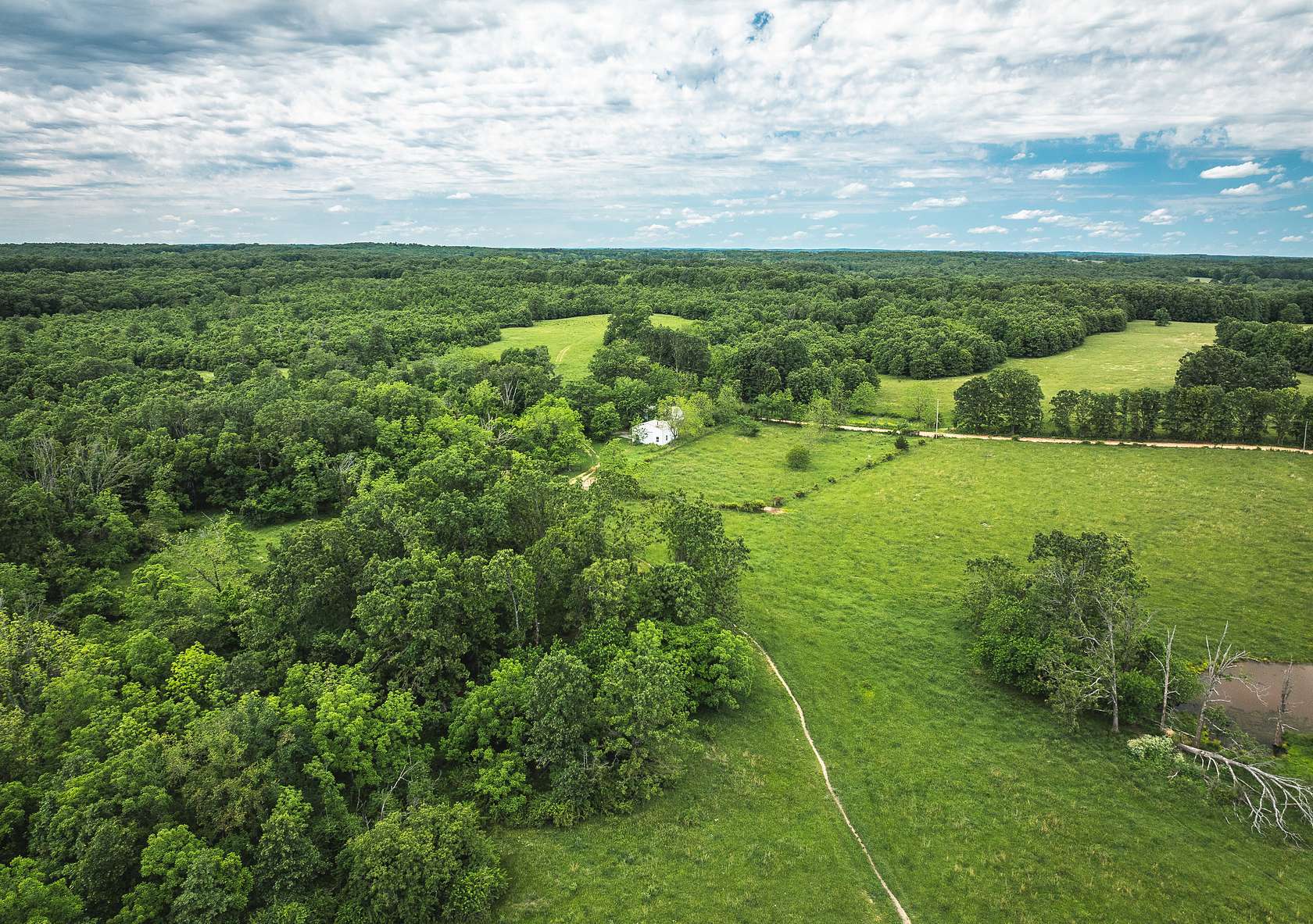 208 Acres of Land with Home for Sale in Mountain View, Missouri