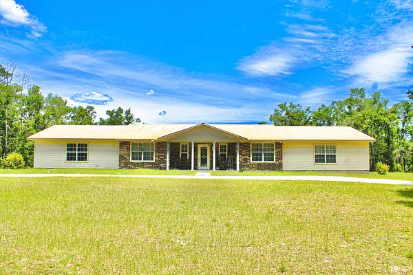 1.56 Acres of Residential Land with Home for Sale in Mayo, Florida