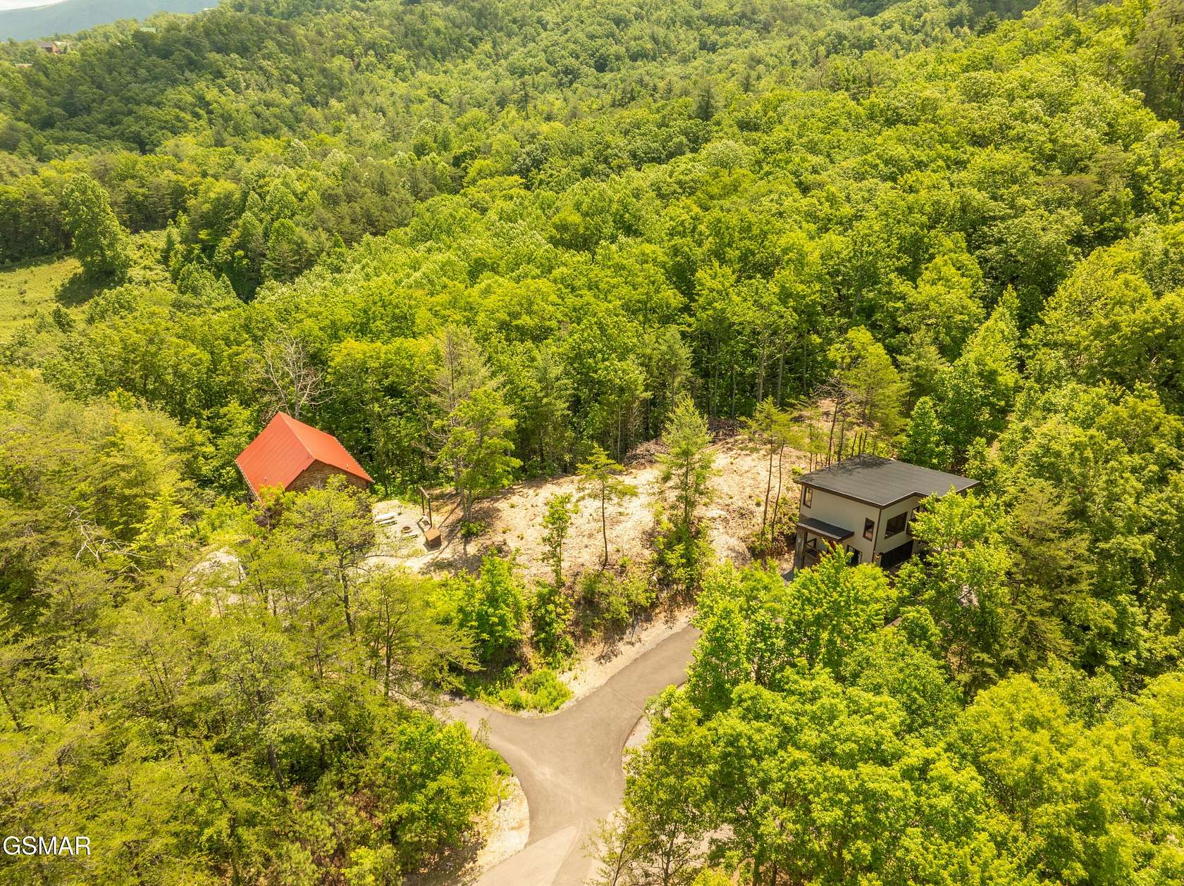 3.8 Acres of Residential Land with Home for Sale in Sevierville, Tennessee