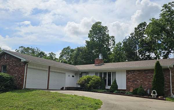 2.4 Acres of Residential Land with Home for Sale in Aurora, Missouri