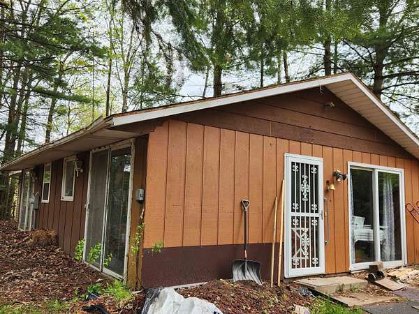 2.9 Acres of Residential Land with Home for Sale in Wausaukee, Wisconsin