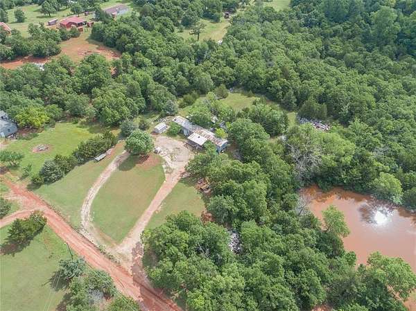 2.4 Acres of Residential Land with Home for Sale in Harrah, Oklahoma