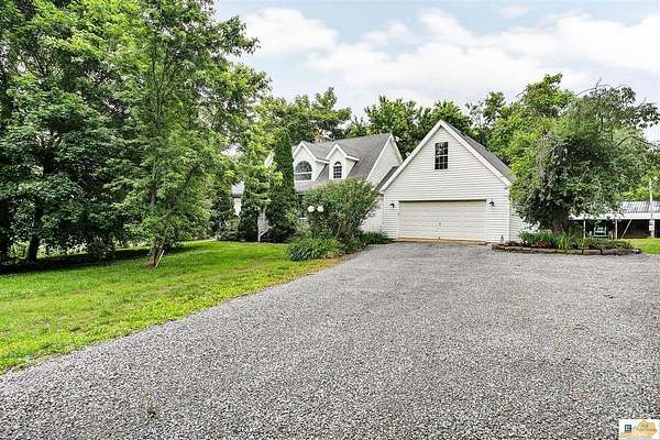 5.5 Acres of Land with Home for Sale in Greensburg, Kentucky