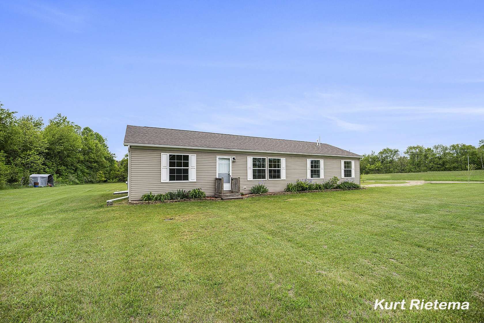 9.57 Acres of Residential Land with Home for Sale in Grand Junction, Michigan