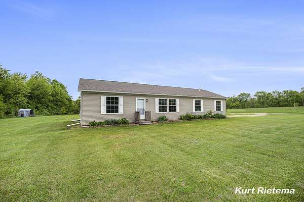 9.57 Acres of Residential Land with Home for Sale in Grand Junction, Michigan