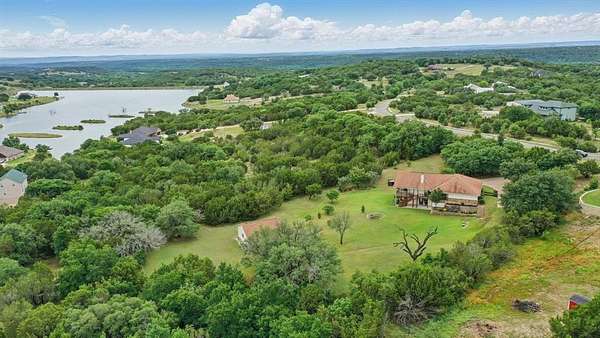 2 Acres of Residential Land with Home for Sale in Bluff Dale, Texas