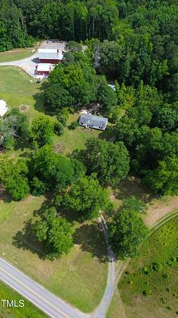 3.1 Acres of Residential Land with Home for Sale in Apex, North Carolina