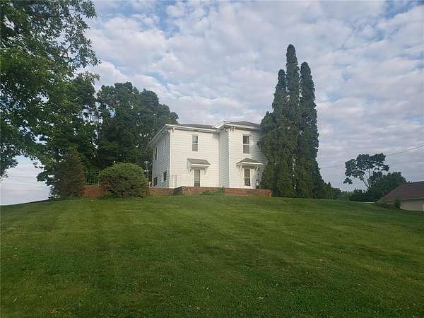 1.75 Acres of Residential Land with Home for Sale in Mechanicsville, Iowa