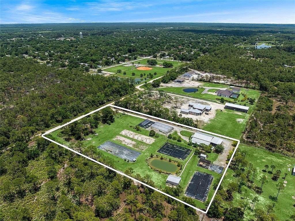 5 Acres of Residential Land with Home for Sale in Fellsmere, Florida