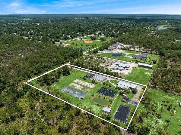 5 Acres of Residential Land with Home for Sale in Fellsmere, Florida