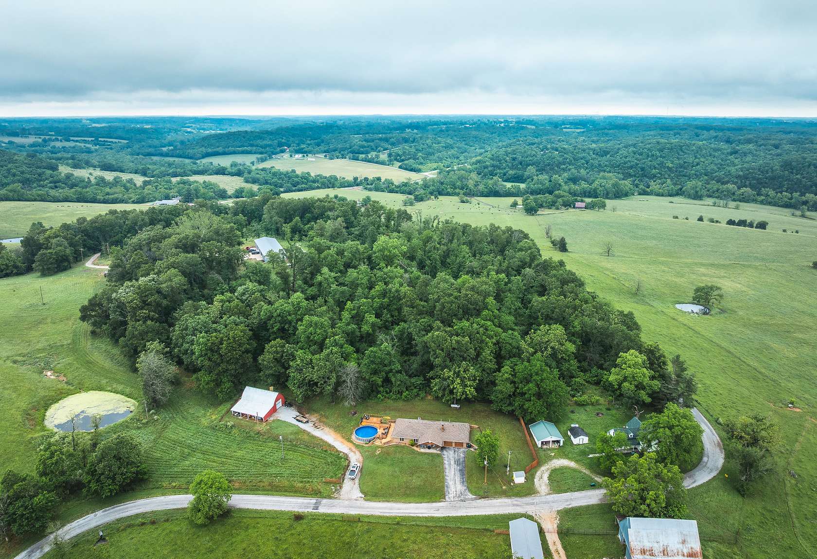 7.5 Acres of Residential Land with Home for Sale in Crane, Missouri