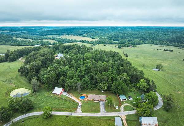 7.5 Acres of Residential Land with Home for Sale in Crane, Missouri